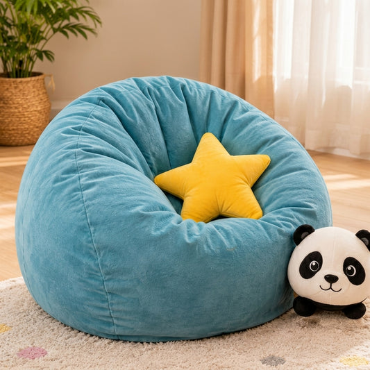 A large teal-blue bean bag chair with a yellow star-shaped pillow in the center, styled in a child's room with a panda plush toy next to it.